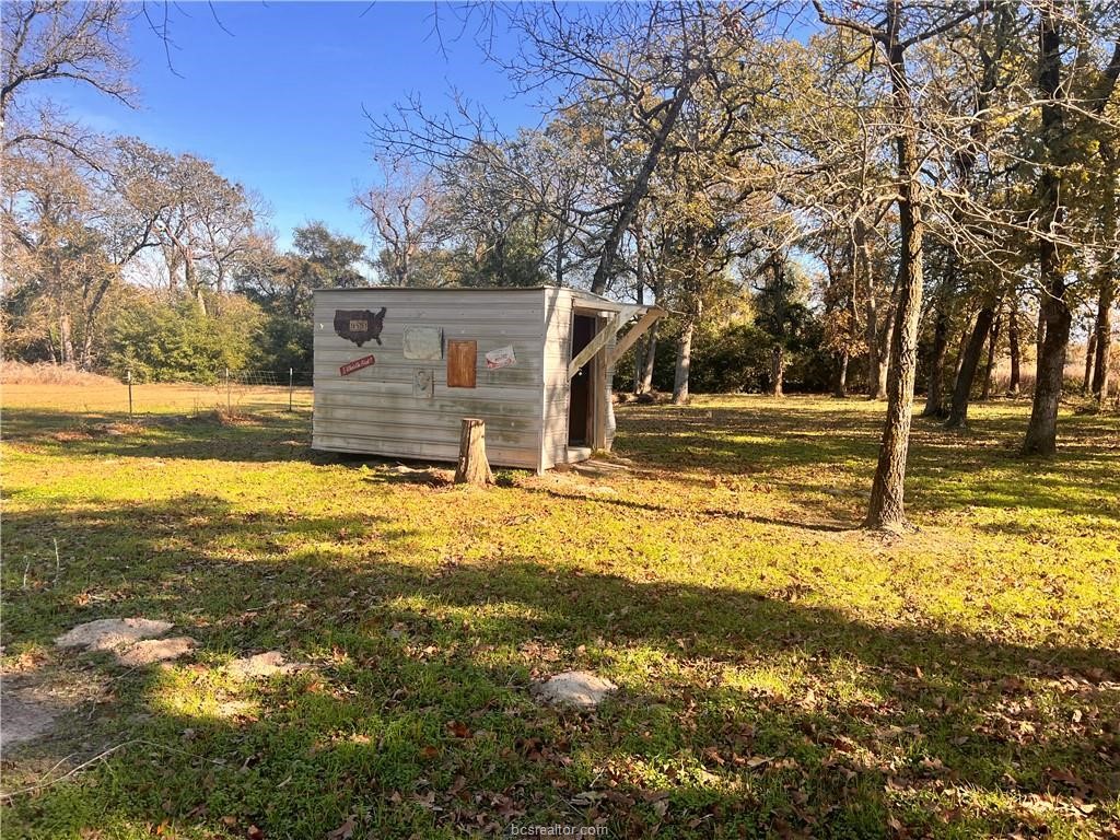 6966 Highway 7 Jewett, TX 75846 - Photo 4 of 18 a view of a yard with swimming pool
