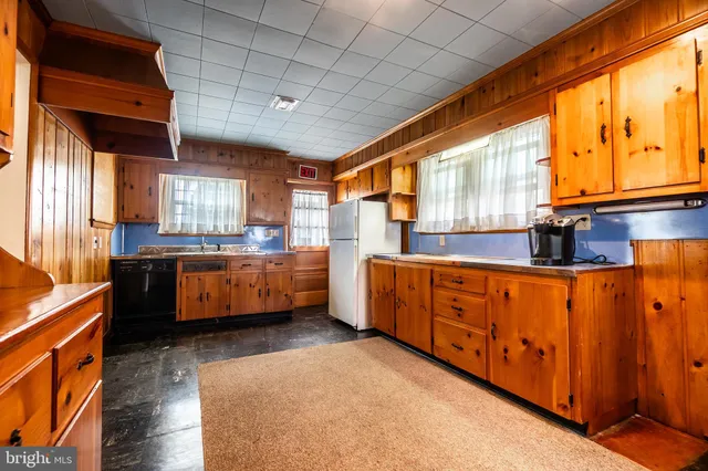 a view of hallway with washer and dryer