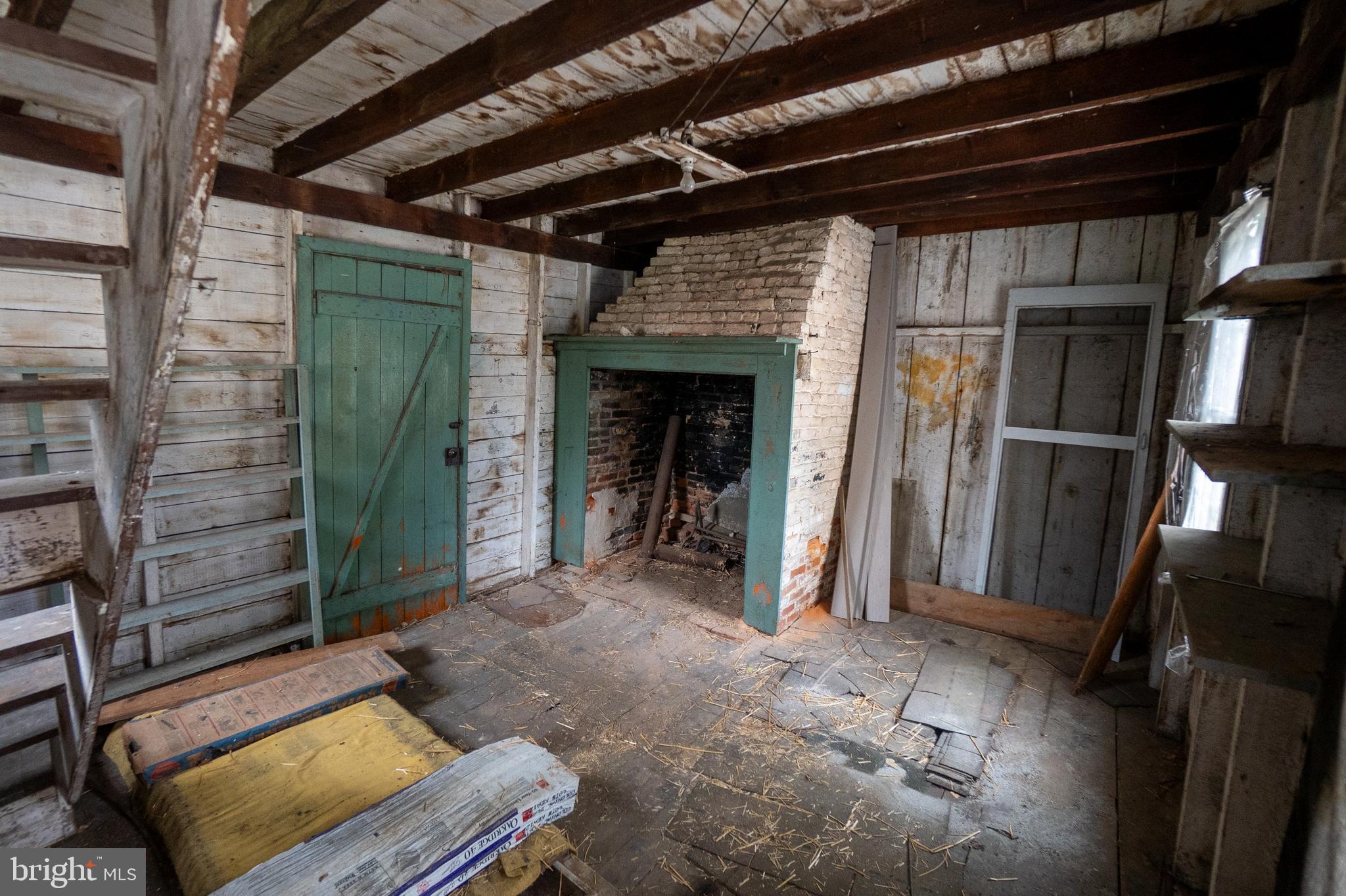 249 York Street Hanover, PA 17331 - Photo 34 of 42 a view of an empty room with wooden floor and a window