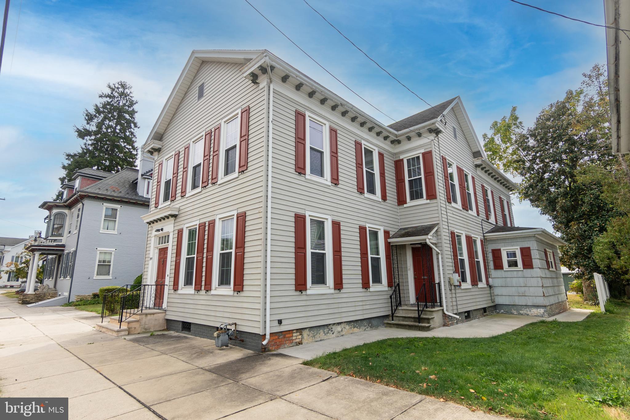 249 York Street Hanover, PA 17331 - Photo 4 of 42 a front view of a house with a yard