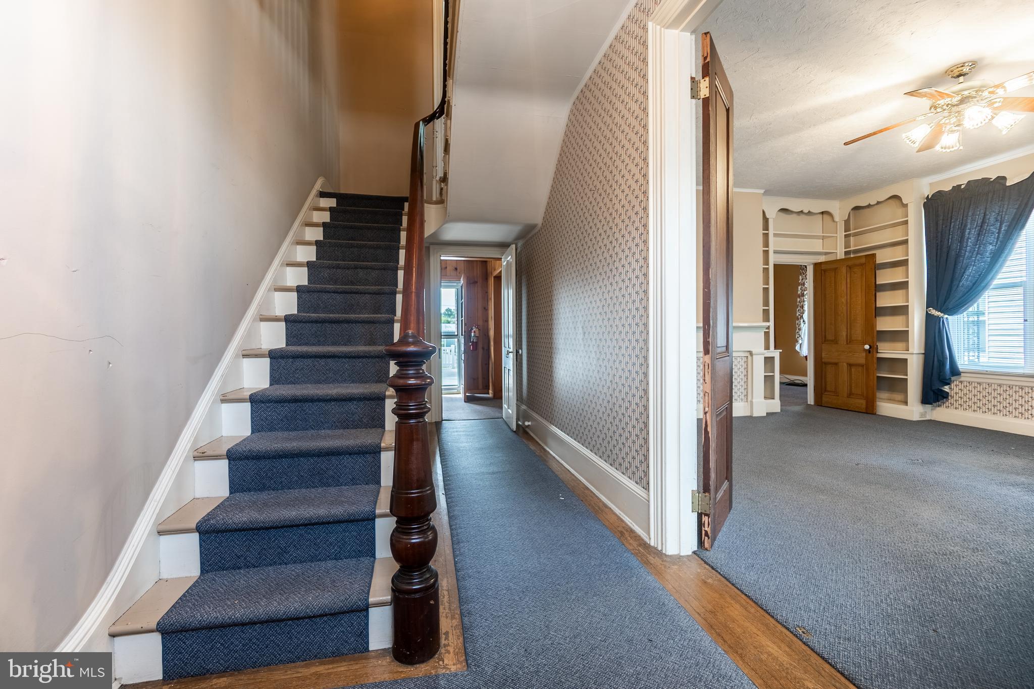 249 York Street Hanover, PA 17331 - Photo 6 of 42 a view of a hallway with wooden floor and entryway
