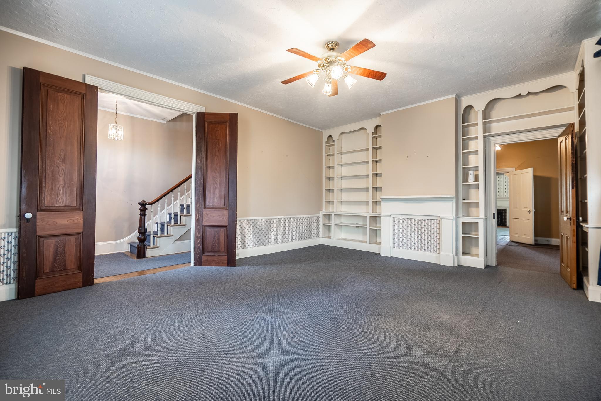 249 York Street Hanover, PA 17331 - Photo 7 of 42 a view of an empty room with a fireplace