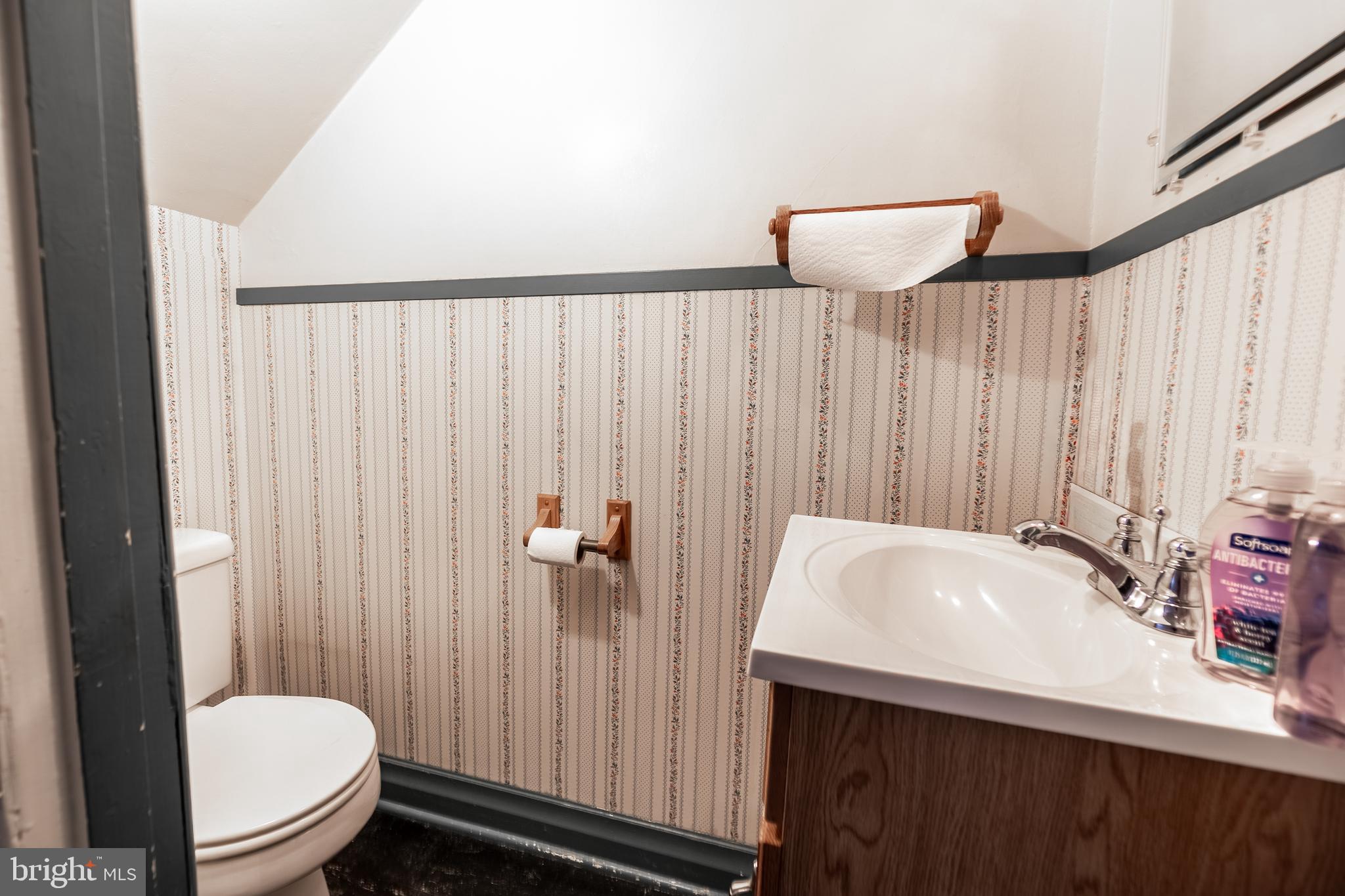 249 York Street Hanover, PA 17331 - Photo 10 of 42 a bathroom with a sink a toilet and shower