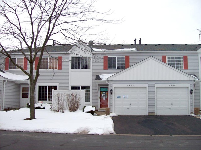 1402 Normantown Road Naperville, IL 60564 - Photo 1 of 11 front view of a house with a yard