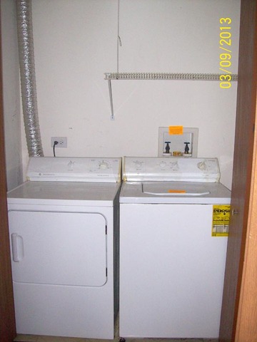 1402 Normantown Road Naperville, IL 60564 - Photo 10 of 11 a utility room with dryer and washer