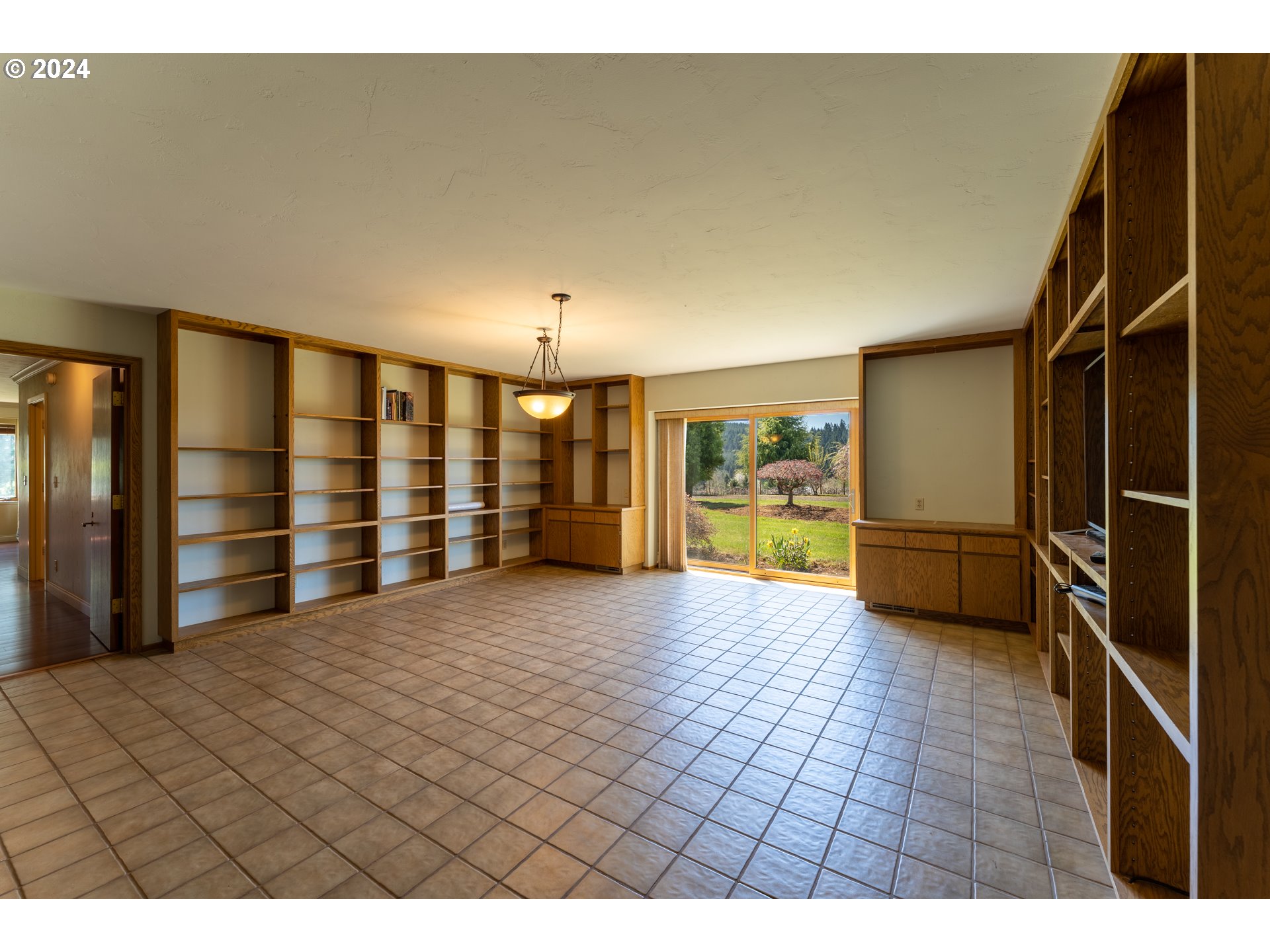 1488 Red Hill Road Oakland, OR 97462 - Photo 11 of 35 a view of an empty room with a window