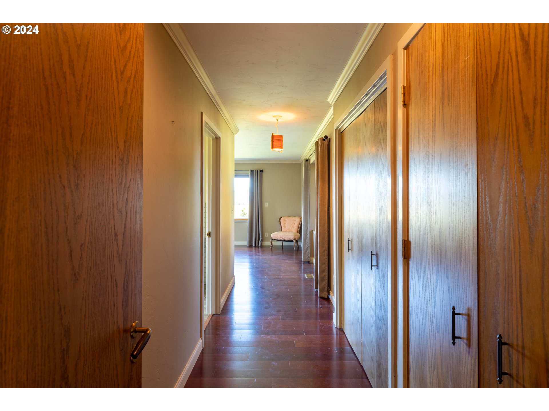 1488 Red Hill Road Oakland, OR 97462 - Photo 14 of 35 a view of a hallway with wooden floor