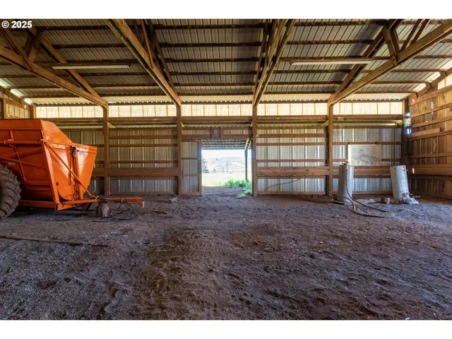 a view of a backyard of the house