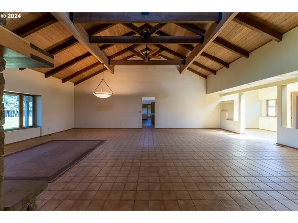 a view of a room with a wooden floor