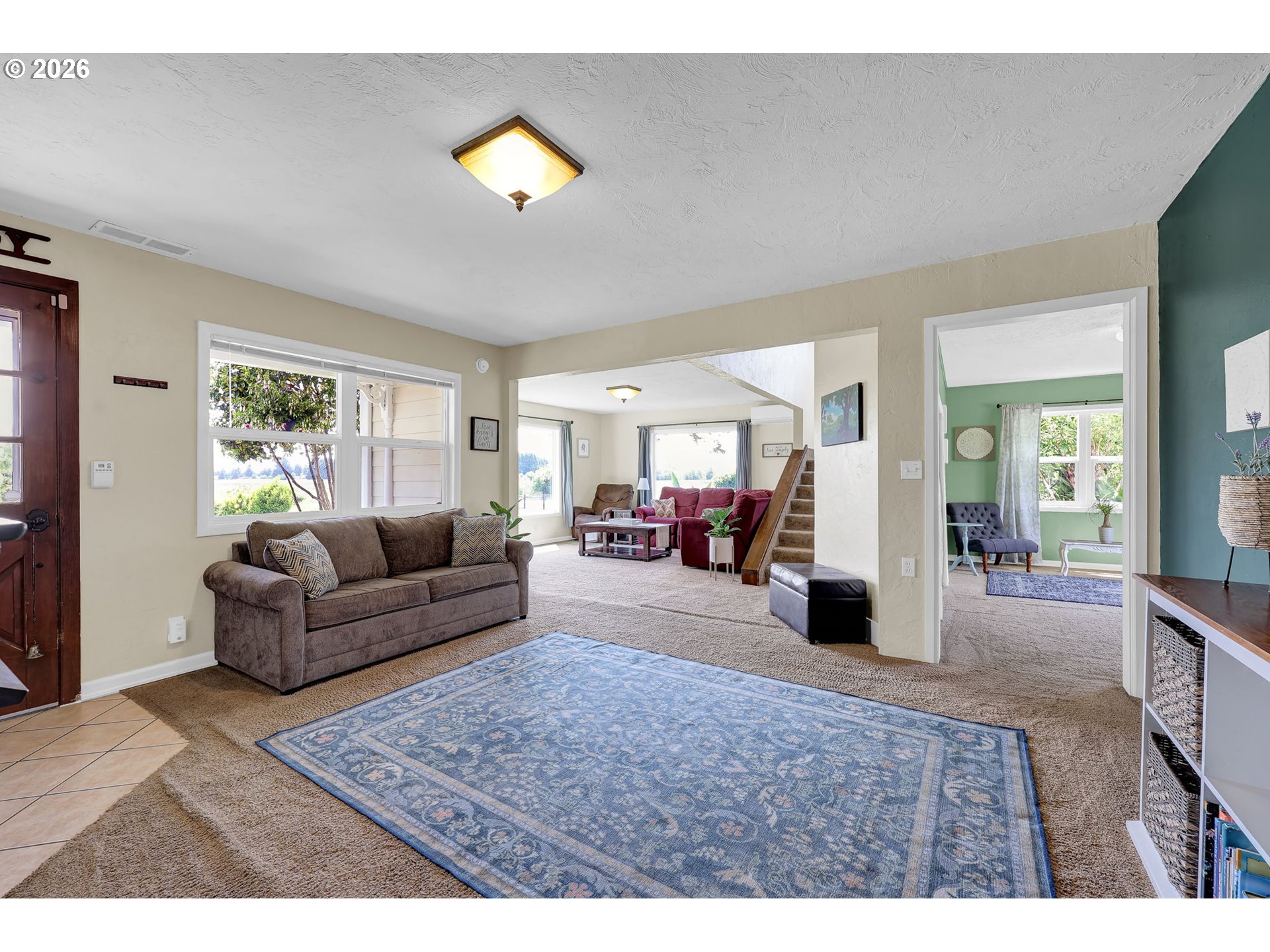90440 Goodman Road Junction City, OR 97448 - Photo 5 of 48 a living room with furniture and a area