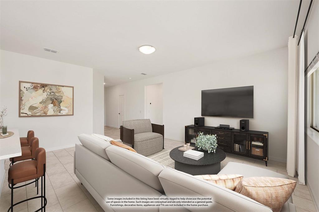 3665 Jordan Way Kaufman, TX 75142 - Photo 9 of 34 a living room with furniture and a flat screen tv