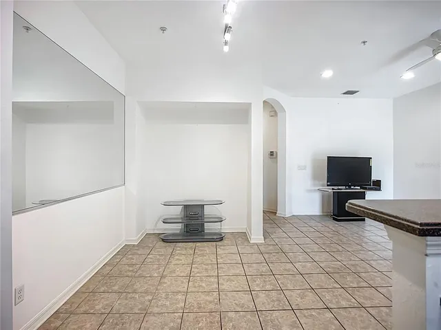 a view of a livingroom with a dinning area furniture and a flat screen tv