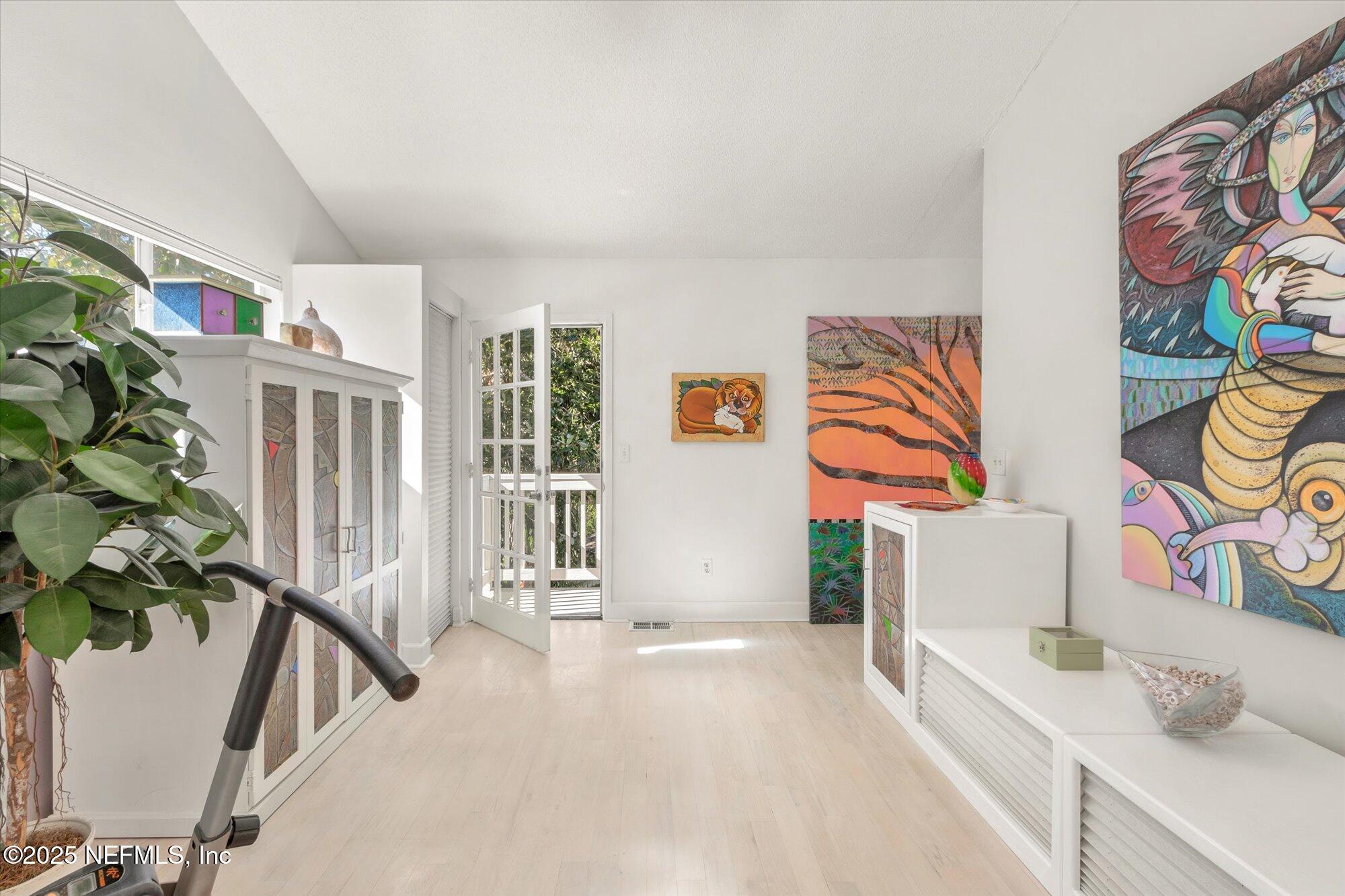 1685 Santander Street St. Augustine, FL 32080 - Photo 25 of 48 a view of an entryway with wooden floor