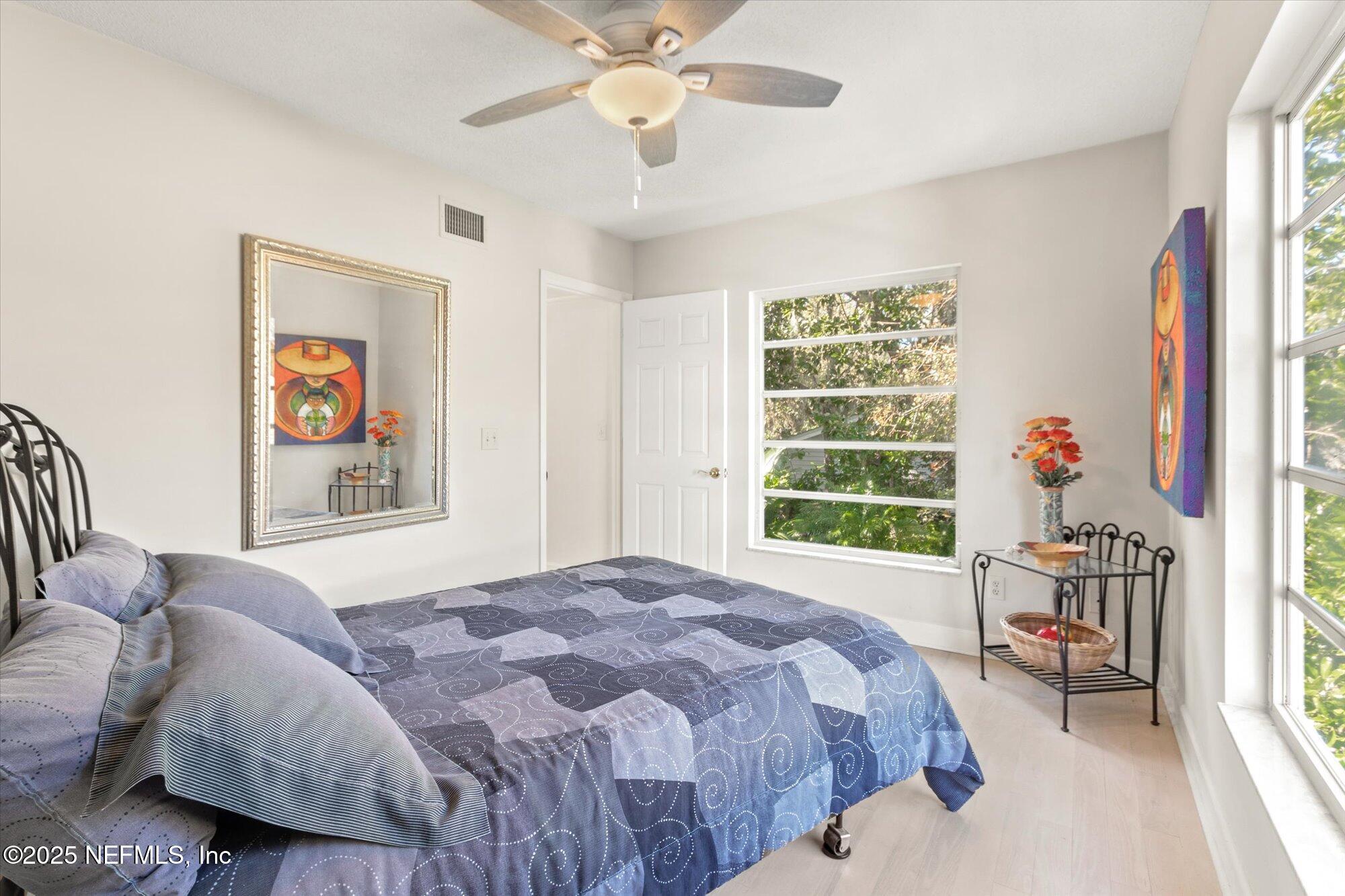 1685 Santander Street St. Augustine, FL 32080 - Photo 29 of 48 a bedroom with a bed and a window