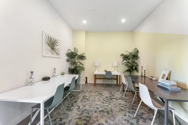 a view of a dining room with furniture