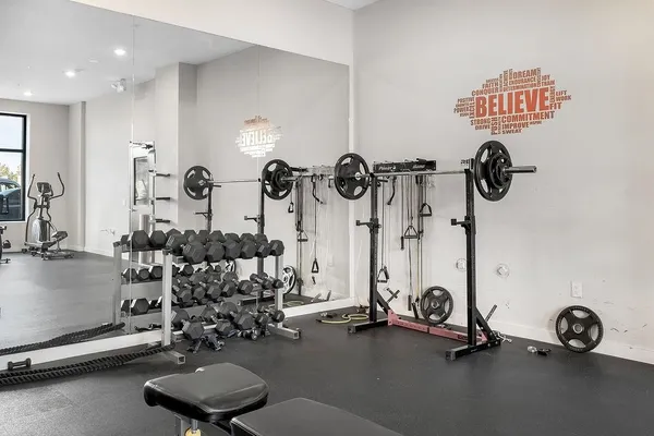 a view of a room with gym equipment