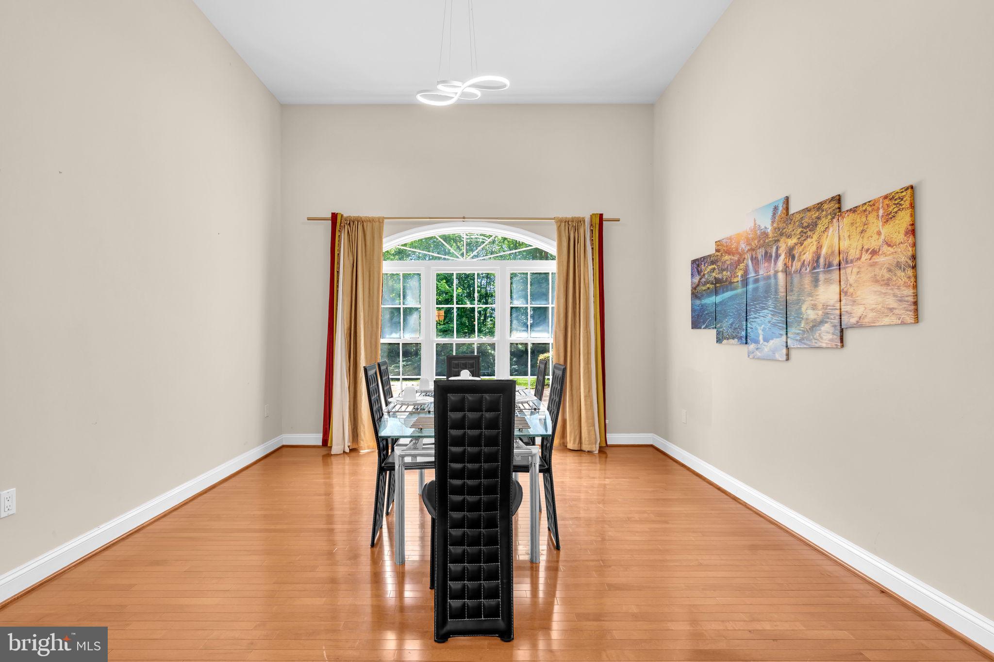 13716 Molly Berry Road Brandywine, MD 20613 - Photo 16 of 75 a view of a room with wooden floor and a window