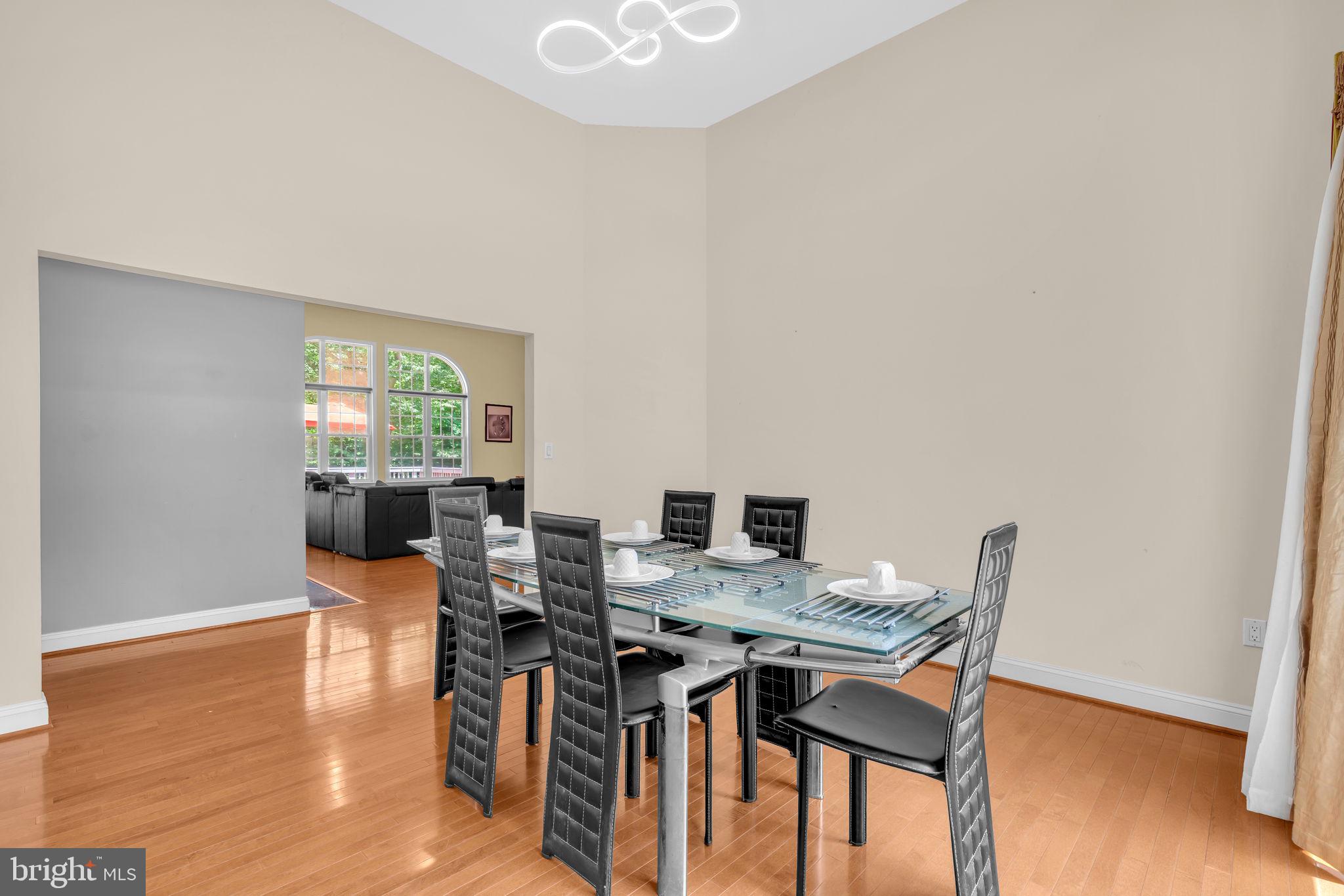 13716 Molly Berry Road Brandywine, MD 20613 - Photo 17 of 75 a workspace with furniture and wooden floor