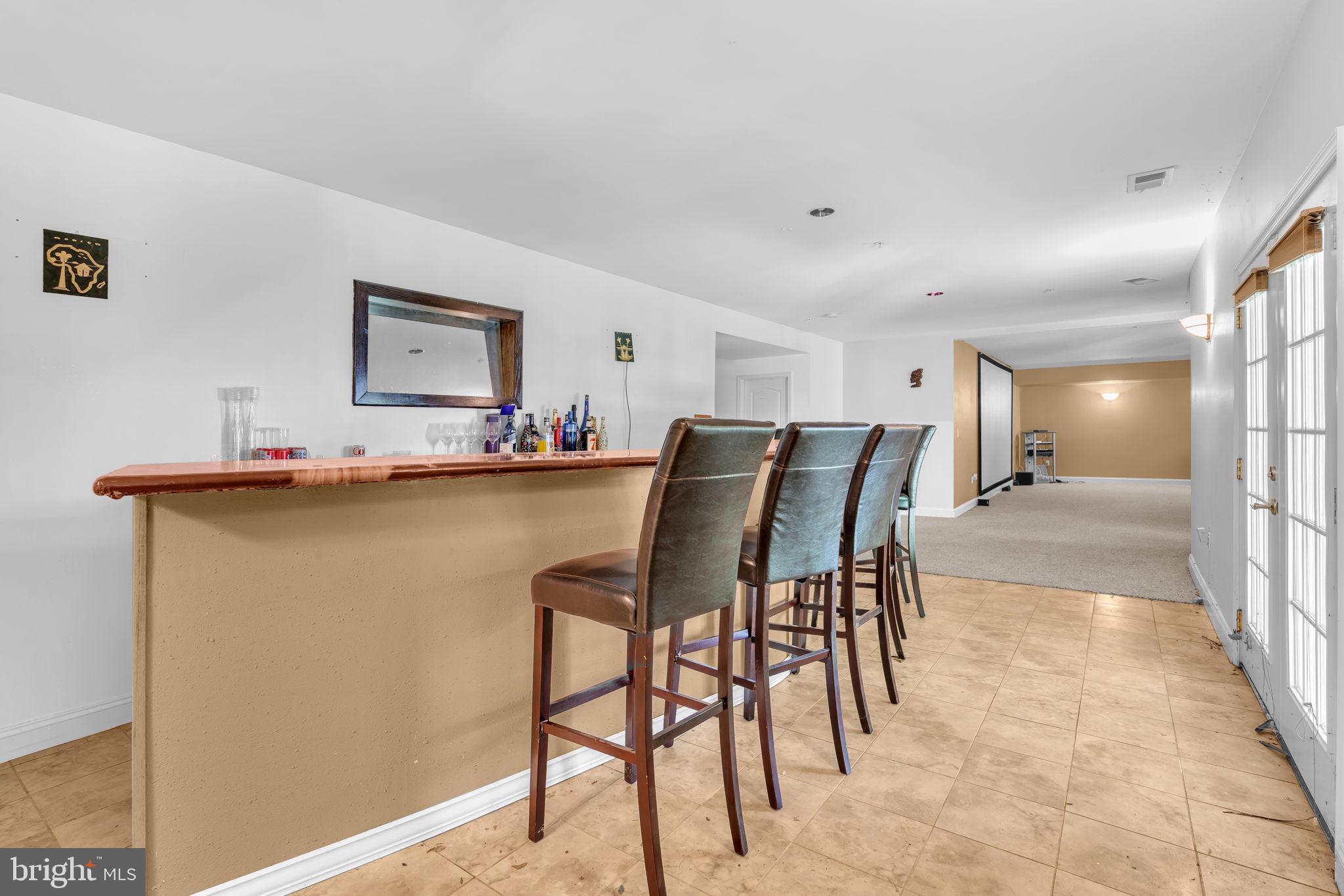 13716 Molly Berry Road Brandywine, MD 20613 - Photo 47 of 75 a dining room with furniture and window