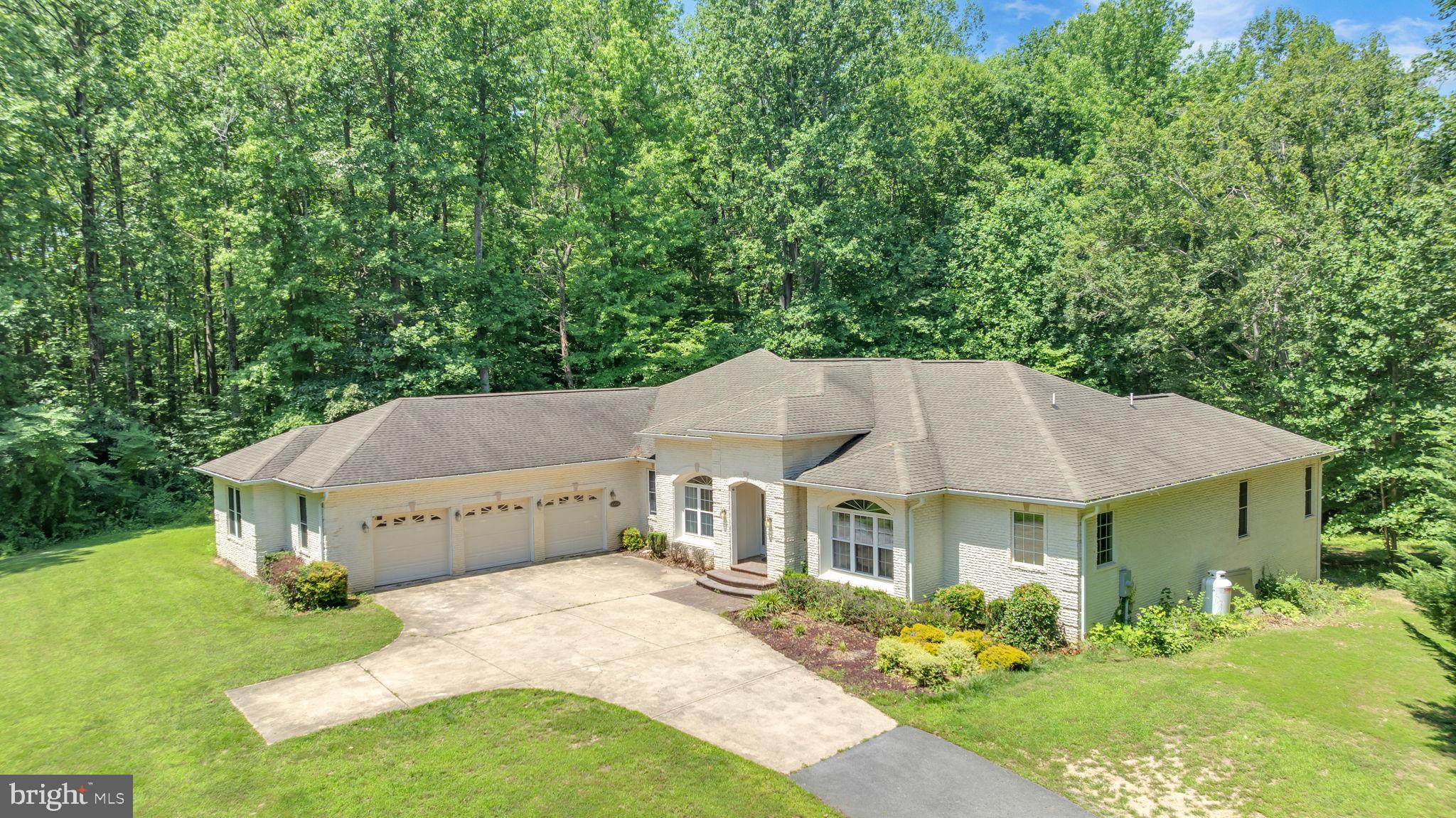 13716 Molly Berry Road Brandywine, MD 20613 - Photo 71 of 75 a house with trees in the background