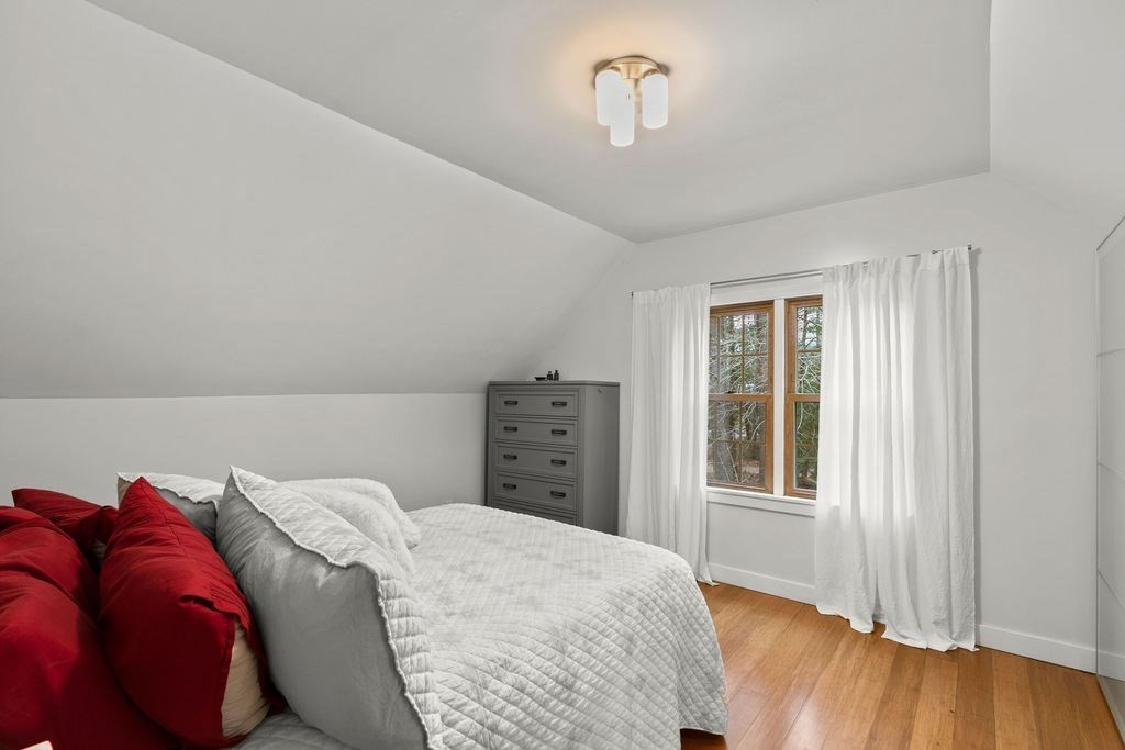 466 Rounseville Road Rochester, MA 02770 - Photo 15 of 38 a bedroom with a large bed and a window