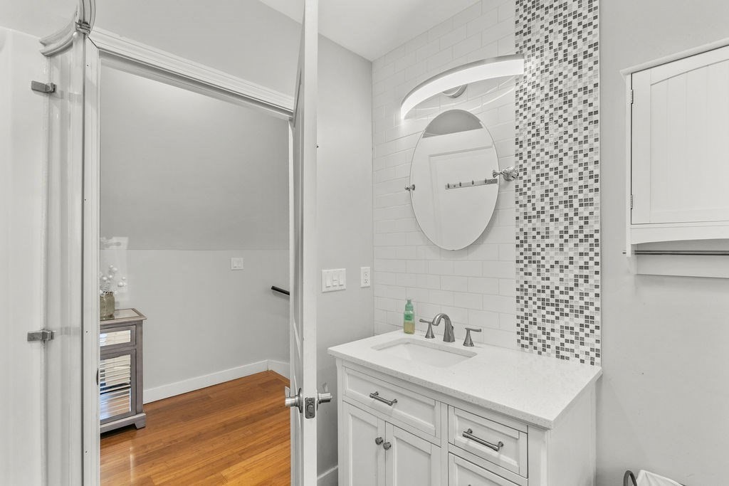 466 Rounseville Road Rochester, MA 02770 - Photo 24 of 38 a bathroom with a sink a toilet and shower