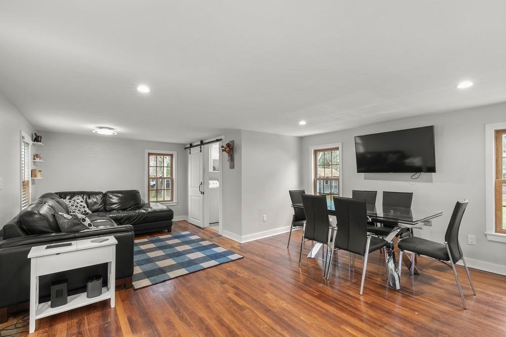 466 Rounseville Road Rochester, MA 02770 - Photo 4 of 38 a living room with furniture and a flat screen tv