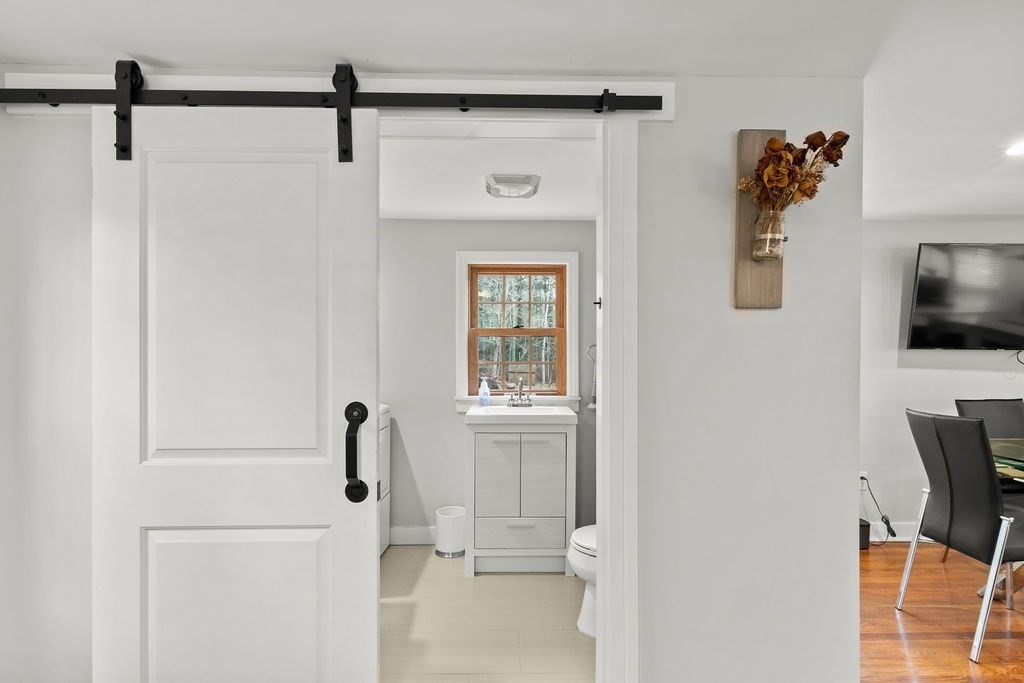 466 Rounseville Road Rochester, MA 02770 - Photo 7 of 38 a bathroom with a bathtub and a shower