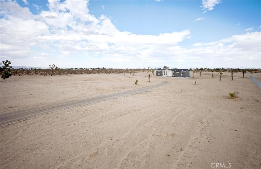 13369 Centola Road Phelan, CA 92371 - Photo 33 of 34 a view of an ocean with beach