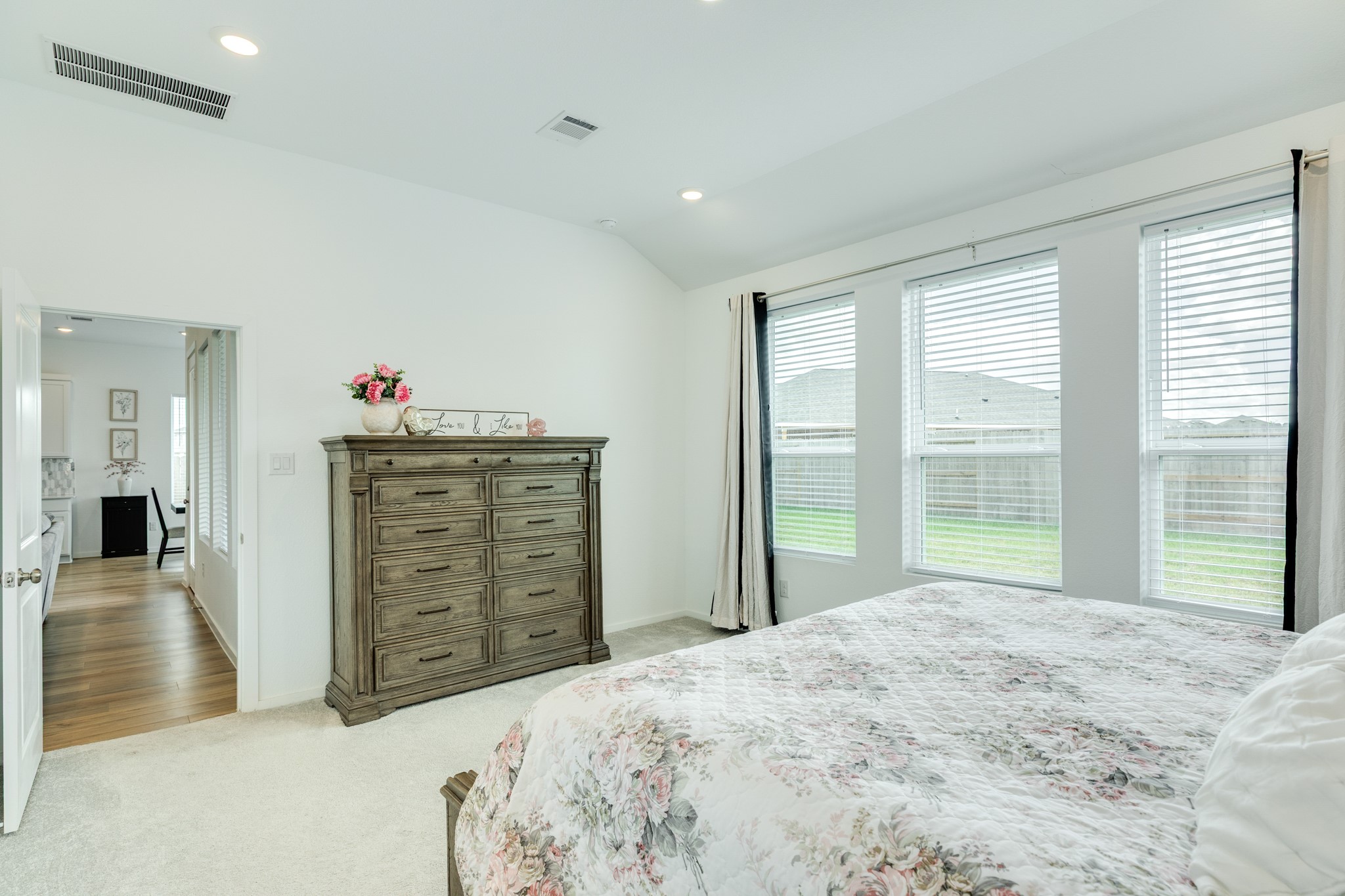 2618 Jasper Oaks Drive Rosharon, TX 77583 - Photo 20 of 43 From this view, you can appreciate the seamless transition from the primary suite to the heart of the home, creating an inviting and functional living space.