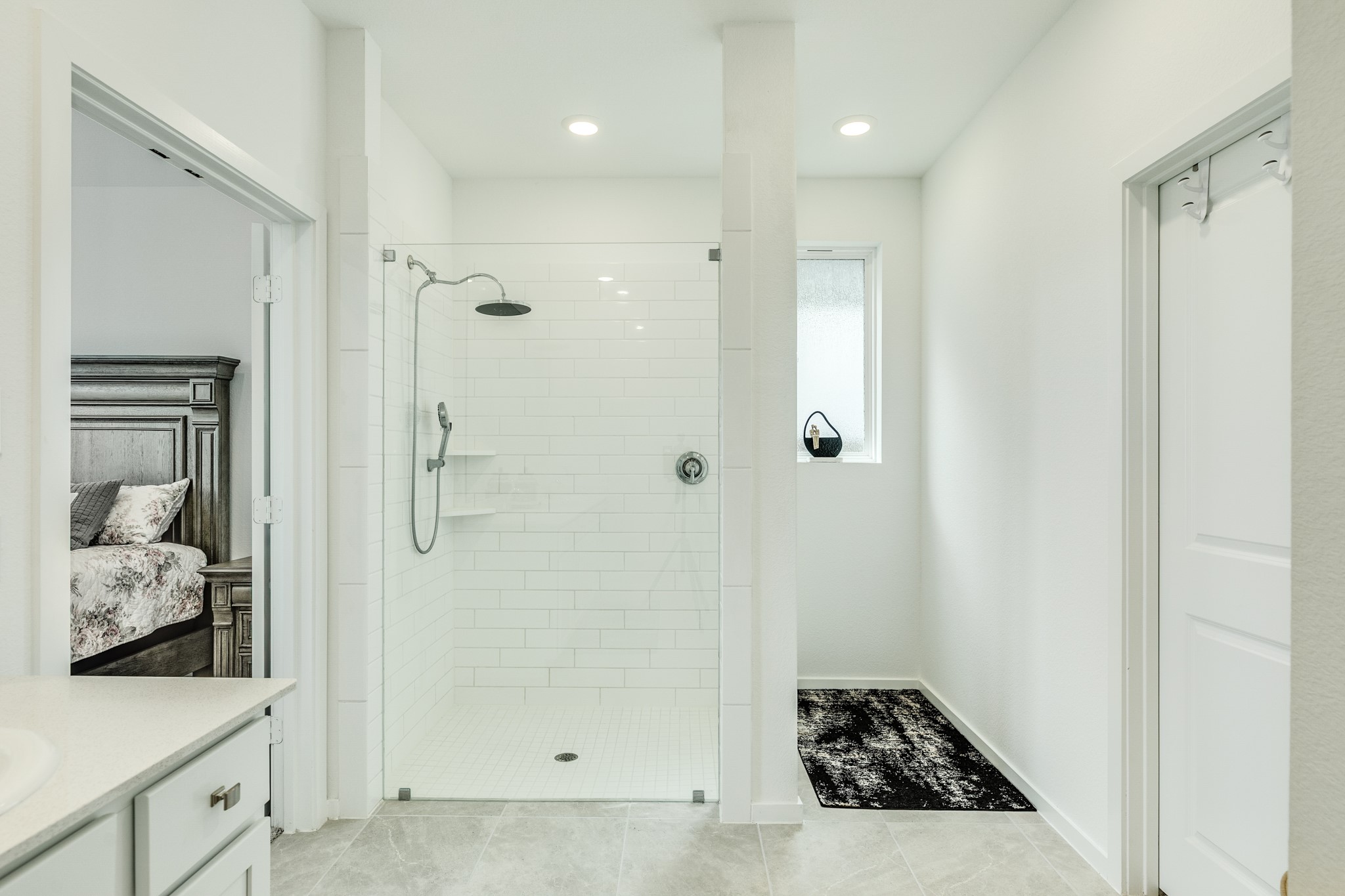 2618 Jasper Oaks Drive Rosharon, TX 77583 - Photo 22 of 43 Primary bath features a glass walk-in shower with a large rain head and tile flooring.