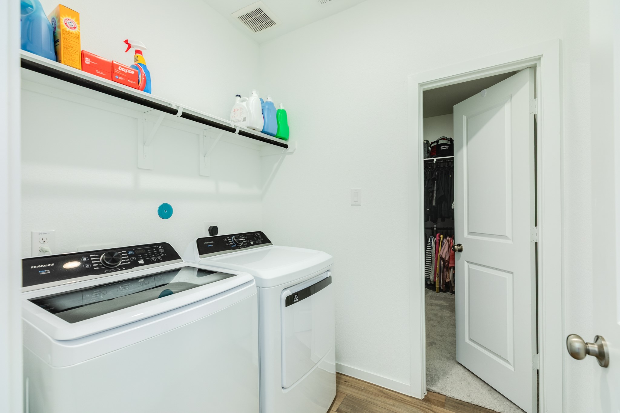 2618 Jasper Oaks Drive Rosharon, TX 77583 - Photo 25 of 43 This view showcases the doorway leading to the primary closet, accessible from the laundry room.