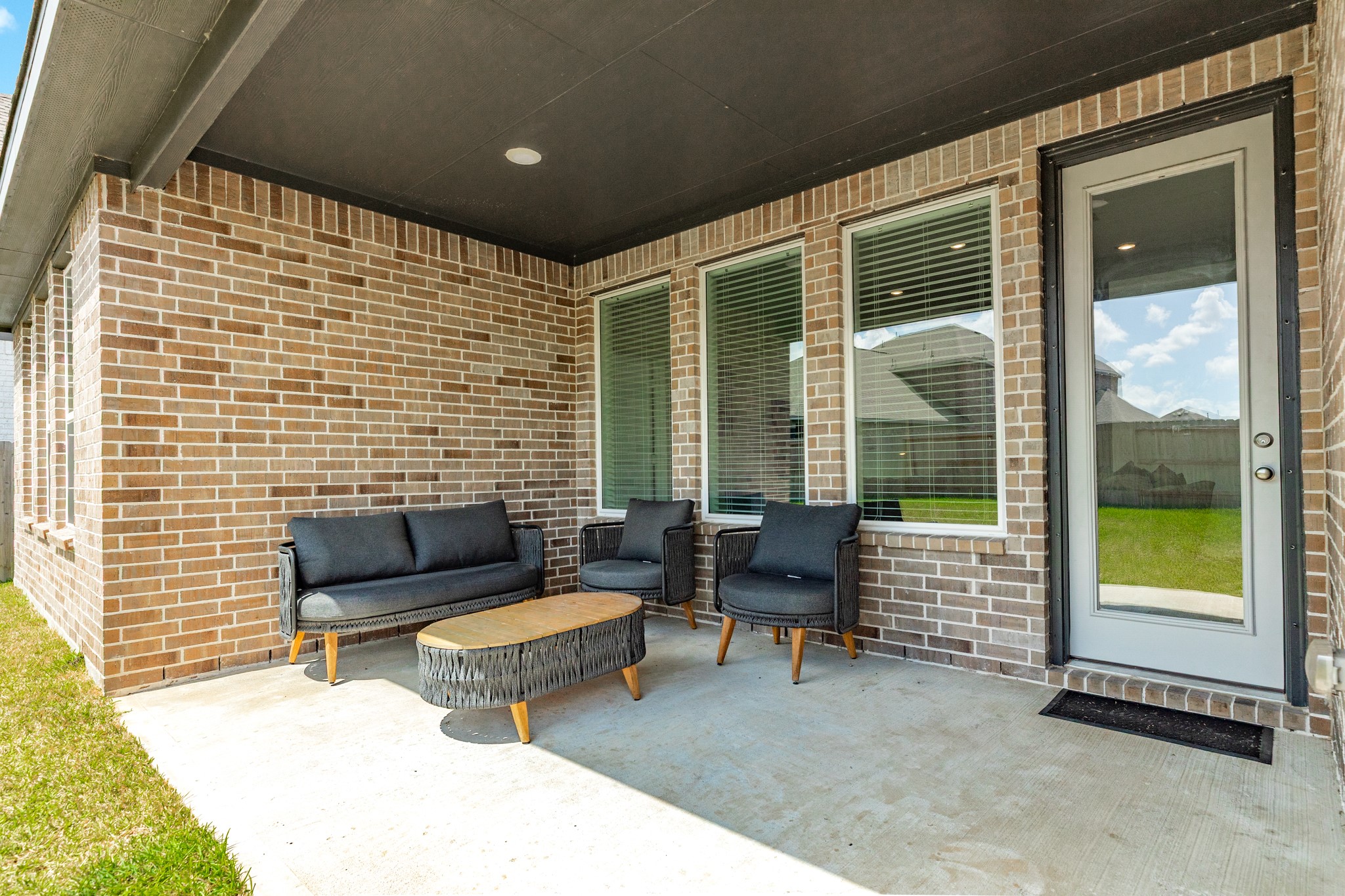 2618 Jasper Oaks Drive Rosharon, TX 77583 - Photo 34 of 43 Spacious covered patio perfect for relaxing and enjoying the comforts of home and the private backyard.