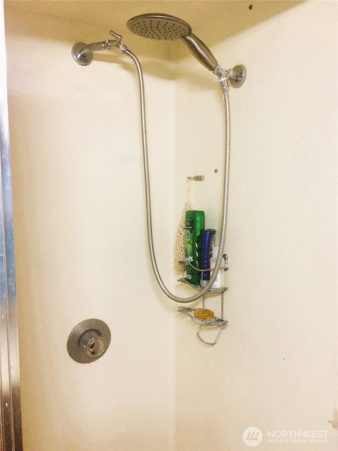 2040 Westlake Avenue North, Unit 10 Seattle, WA 98109 - Photo 11 of 14 a bathroom with a shower