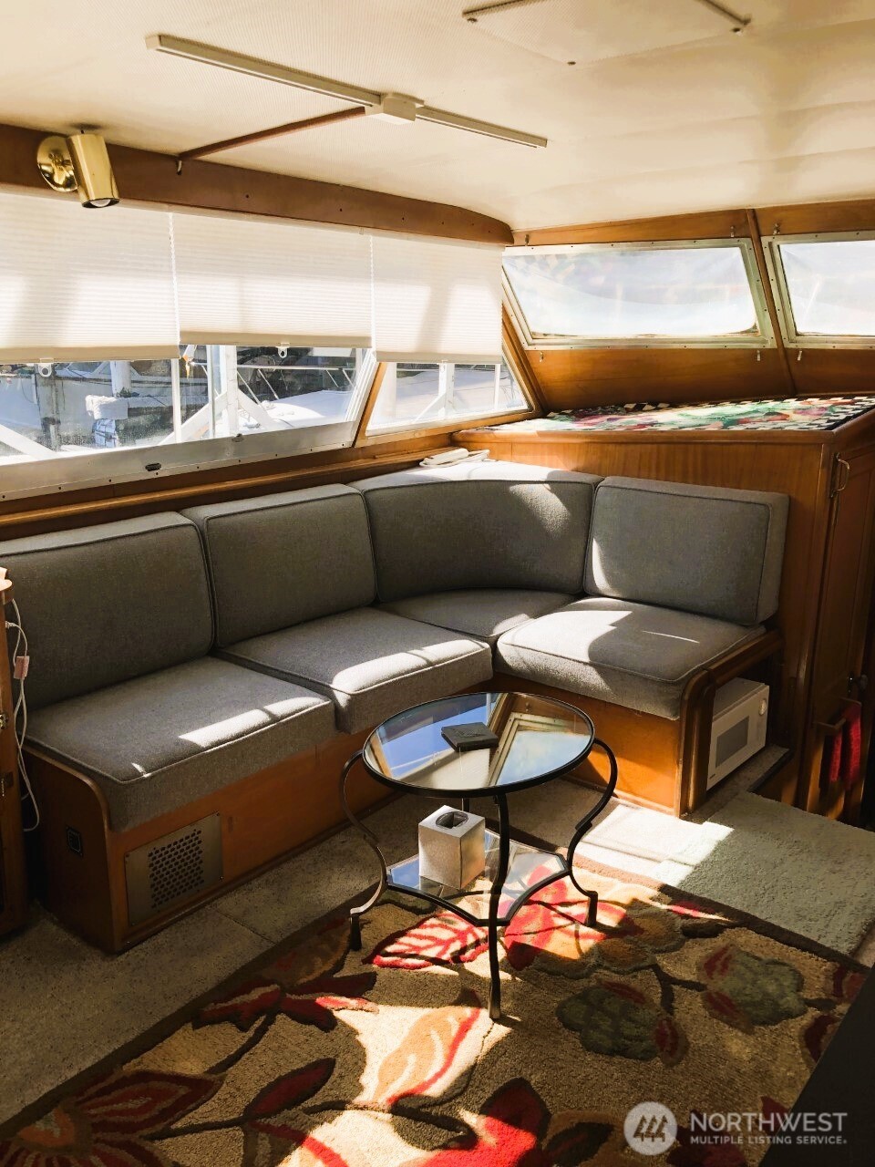 2040 Westlake Avenue North, Unit 10 Seattle, WA 98109 - Photo 4 of 14 a living room with furniture and rug