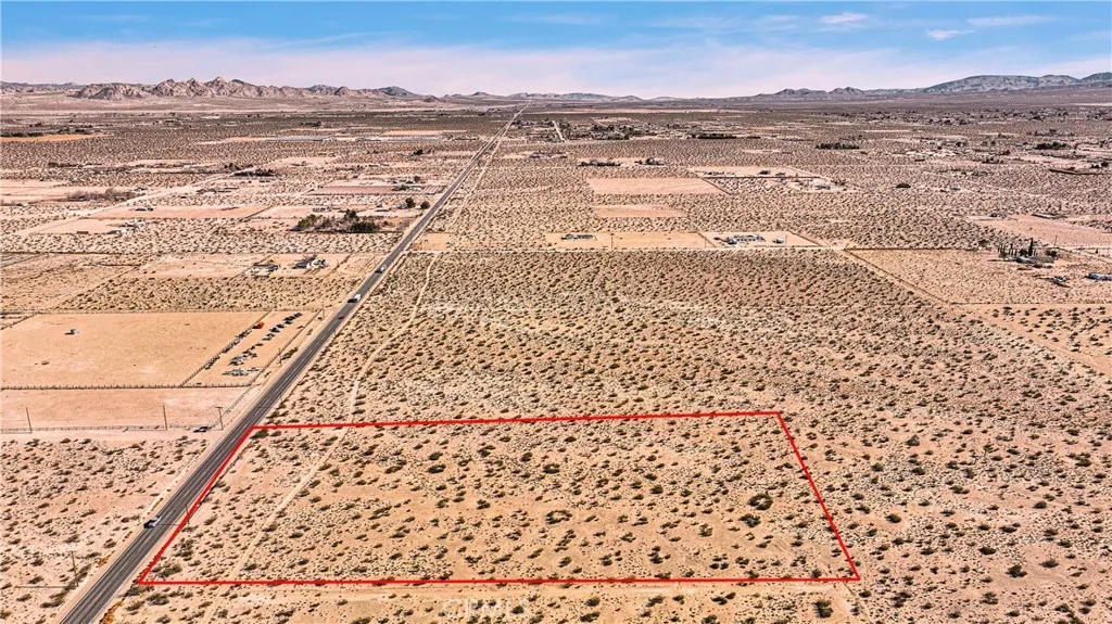0 Old Woman Springs Road Lucerne Valley, CA 92356 - Photo 5 of 22 a view of an ocean beach and mountain view