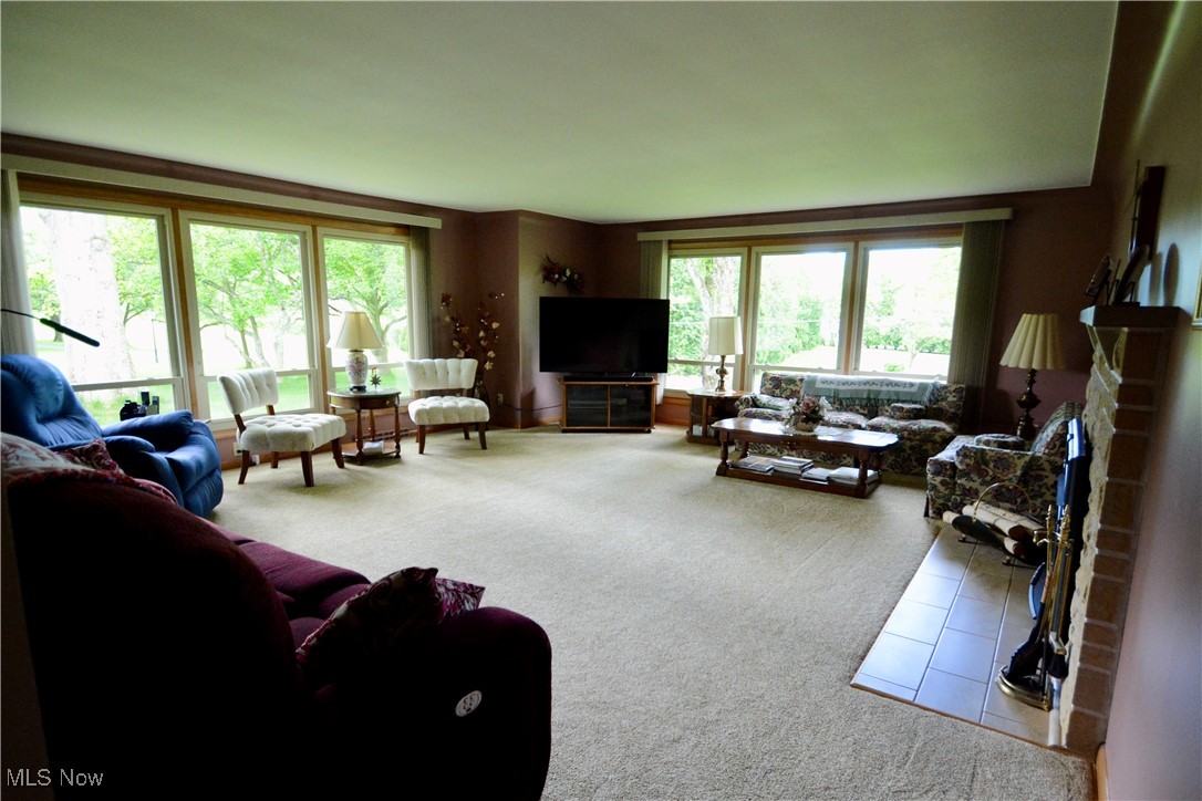2724 Spitler Road Youngstown, OH 44514 - Photo 21 of 30 Living area with carpet floors and healthy amount of natural light
