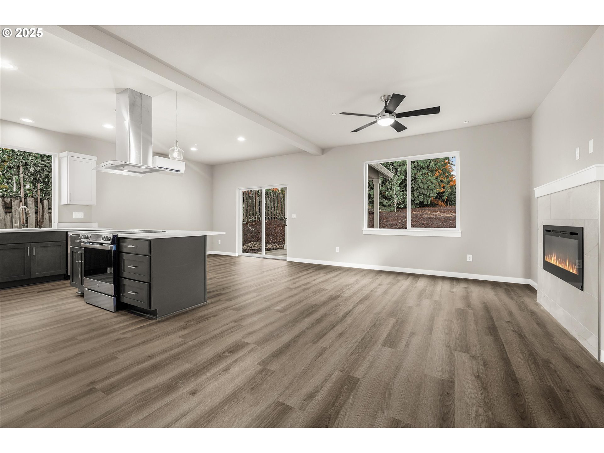 185 Southwest Mawrcrest Avenue Gresham, OR 97030 - Photo 11 of 46 a living room with furniture and a wooden floor