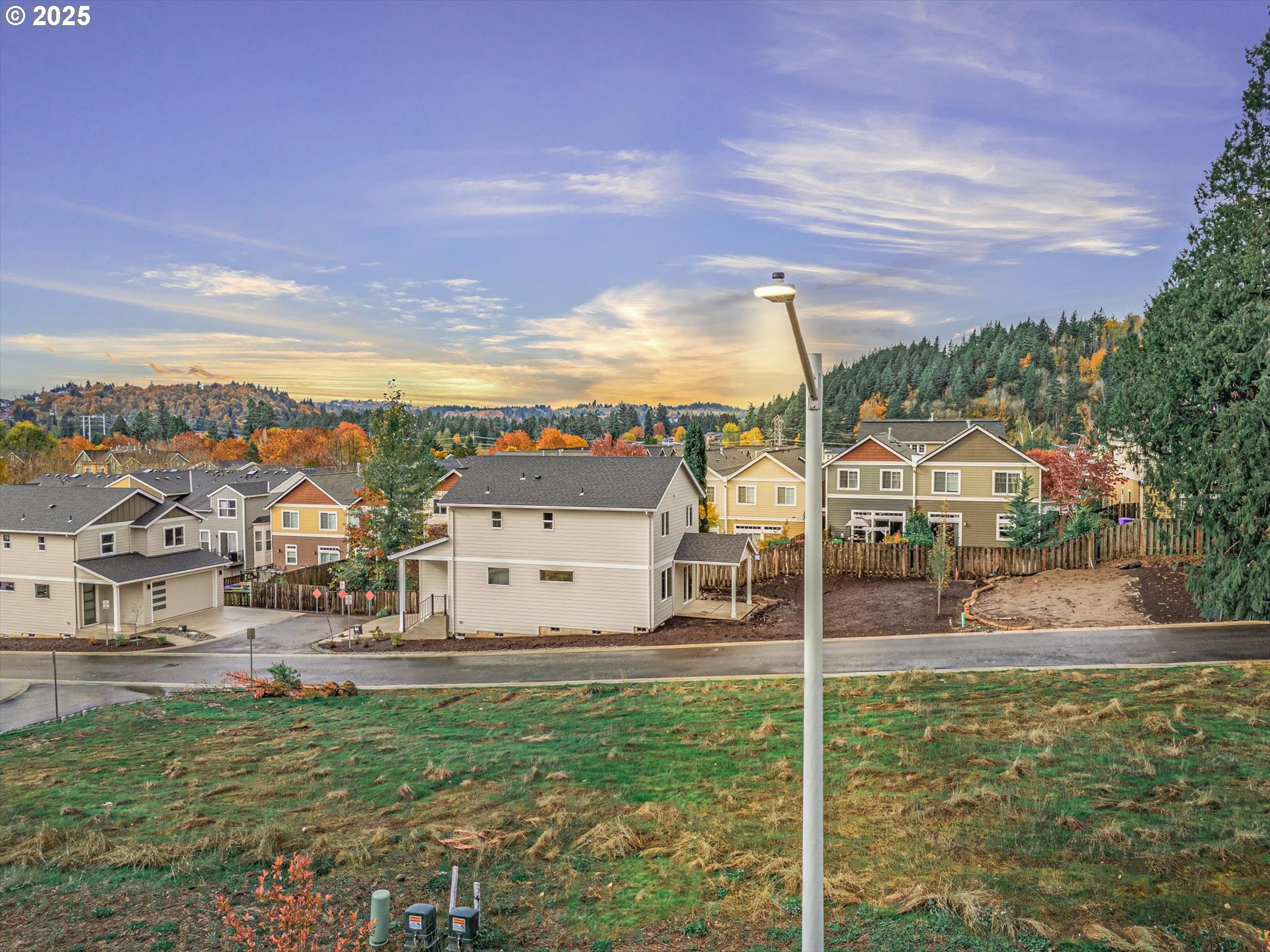 185 Southwest Mawrcrest Avenue Gresham, OR 97030 - Photo 2 of 46 a view of a house with a yard