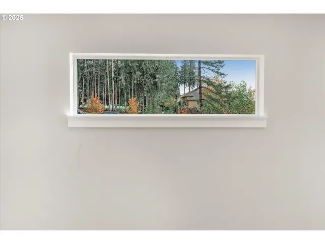 a view of a room that has a window