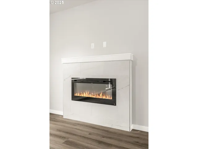 a stone wall with a wall painting