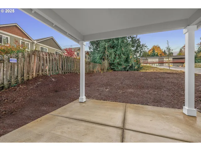a view of a house with a street