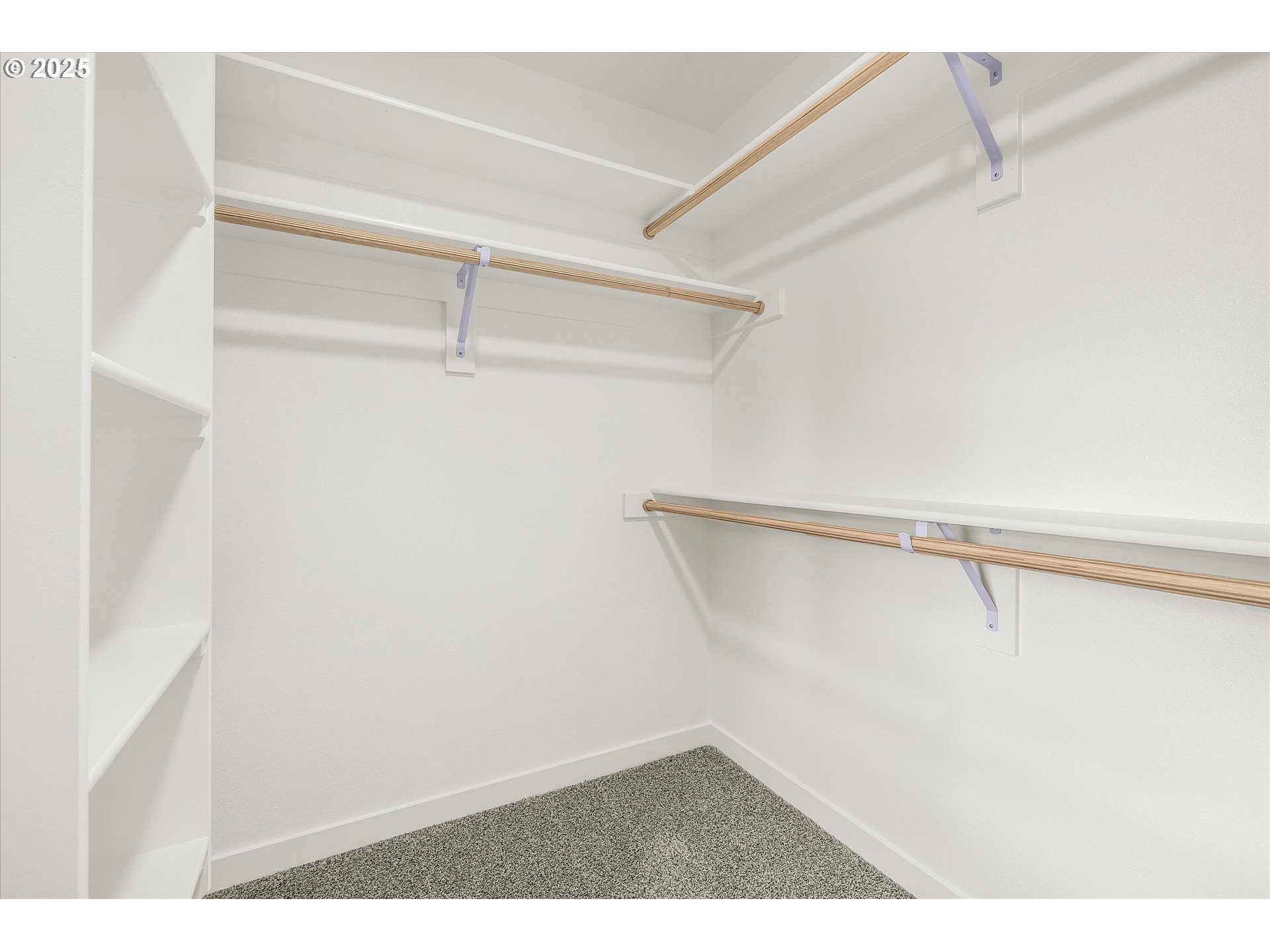 185 Southwest Mawrcrest Avenue Gresham, OR 97030 - Photo 36 of 46 a view of a room with racks on the wall