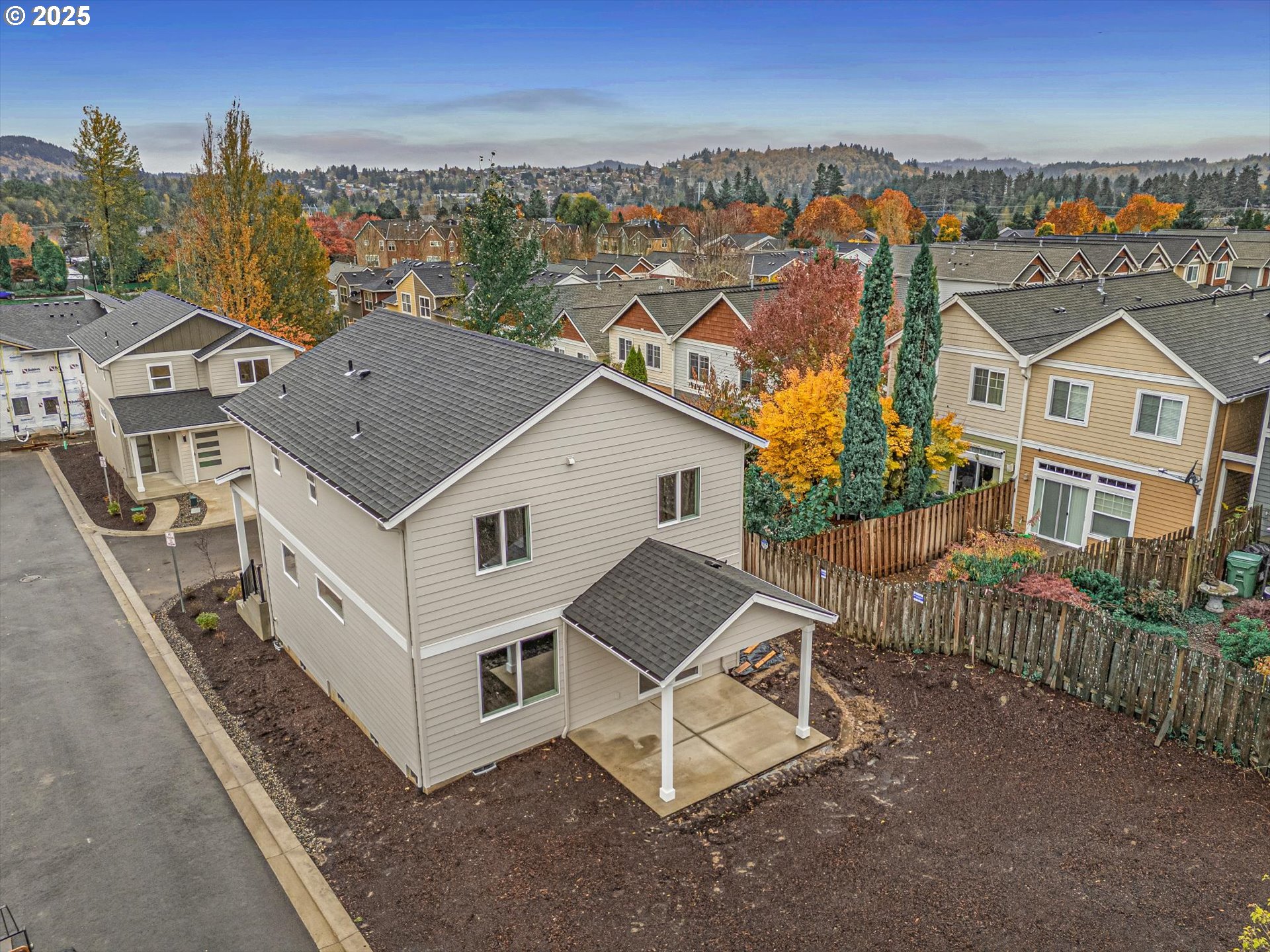 185 Southwest Mawrcrest Avenue Gresham, OR 97030 - Photo 4 of 46 an aerial view of a house with wooden fence