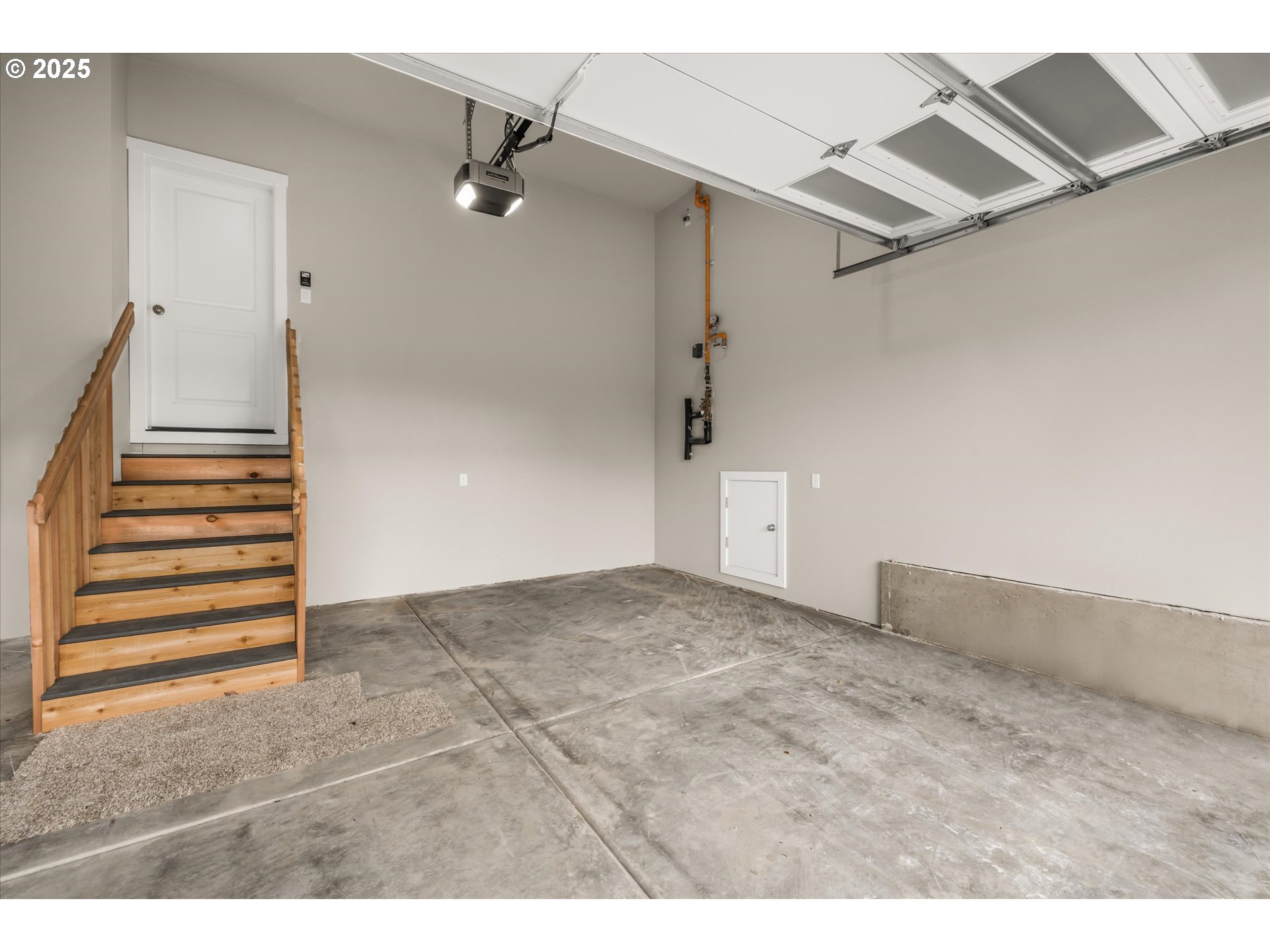 185 Southwest Mawrcrest Avenue Gresham, OR 97030 - Photo 41 of 46 a view of a room with stairs and a ceiling fan