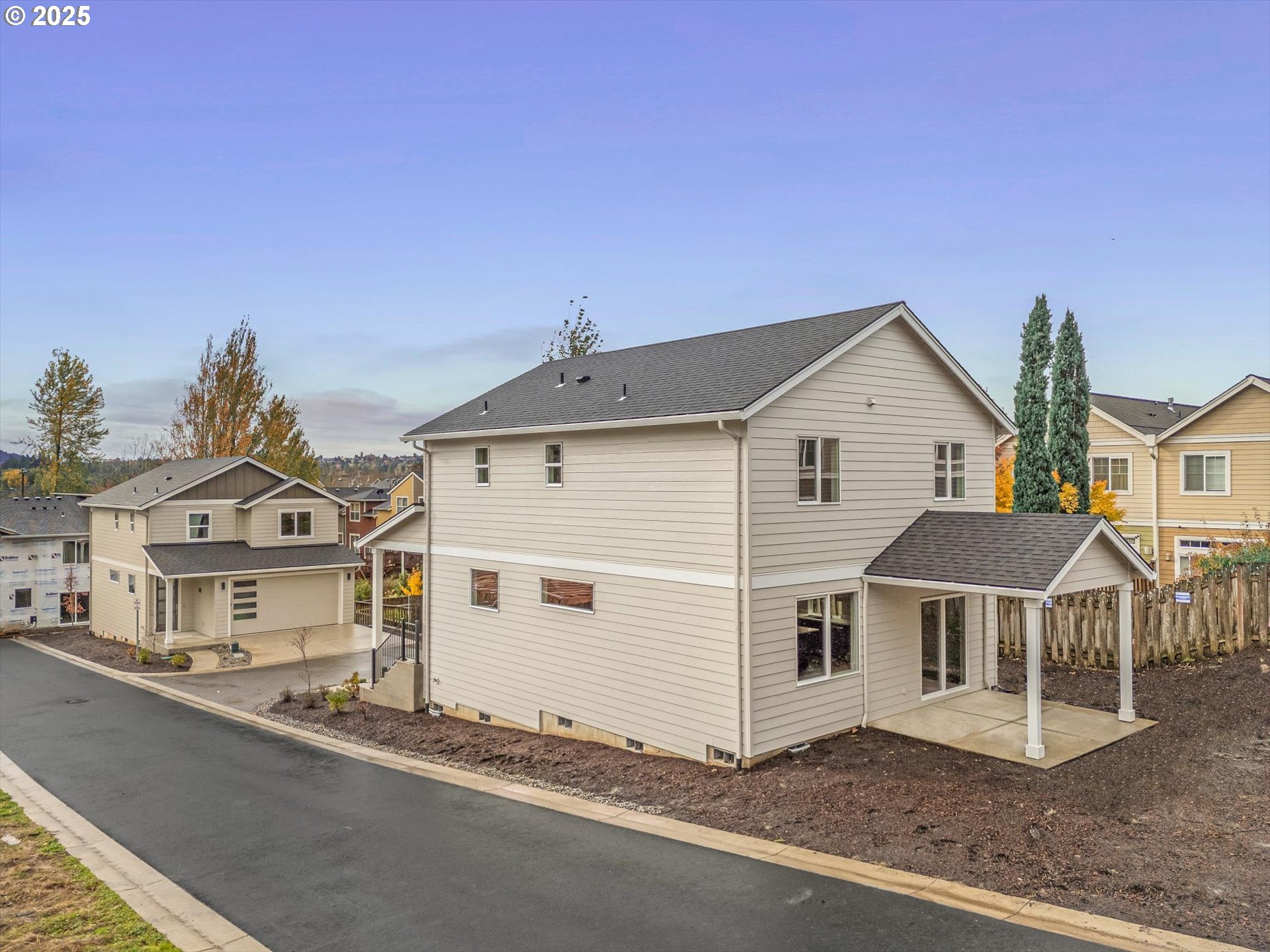 185 Southwest Mawrcrest Avenue Gresham, OR 97030 - Photo 42 of 46 a view of a house with a street