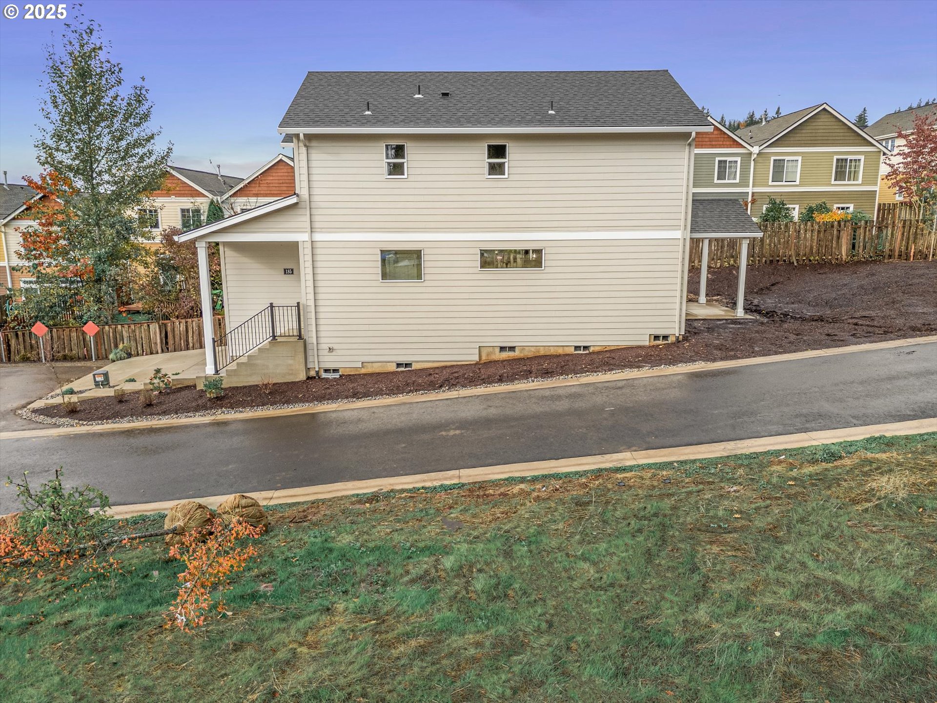 185 Southwest Mawrcrest Avenue Gresham, OR 97030 - Photo 43 of 46 a front view of a house with a yard