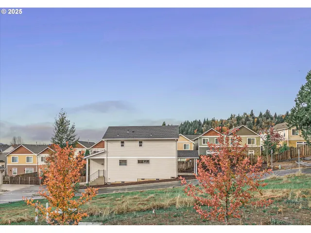 an aerial view of residential house with an outdoor space