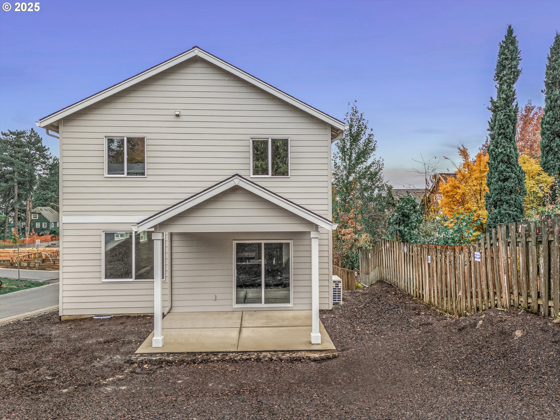 185 Southwest Mawrcrest Avenue Gresham, OR 97030 - Photo 6 of 46 a front view of a house with a yard