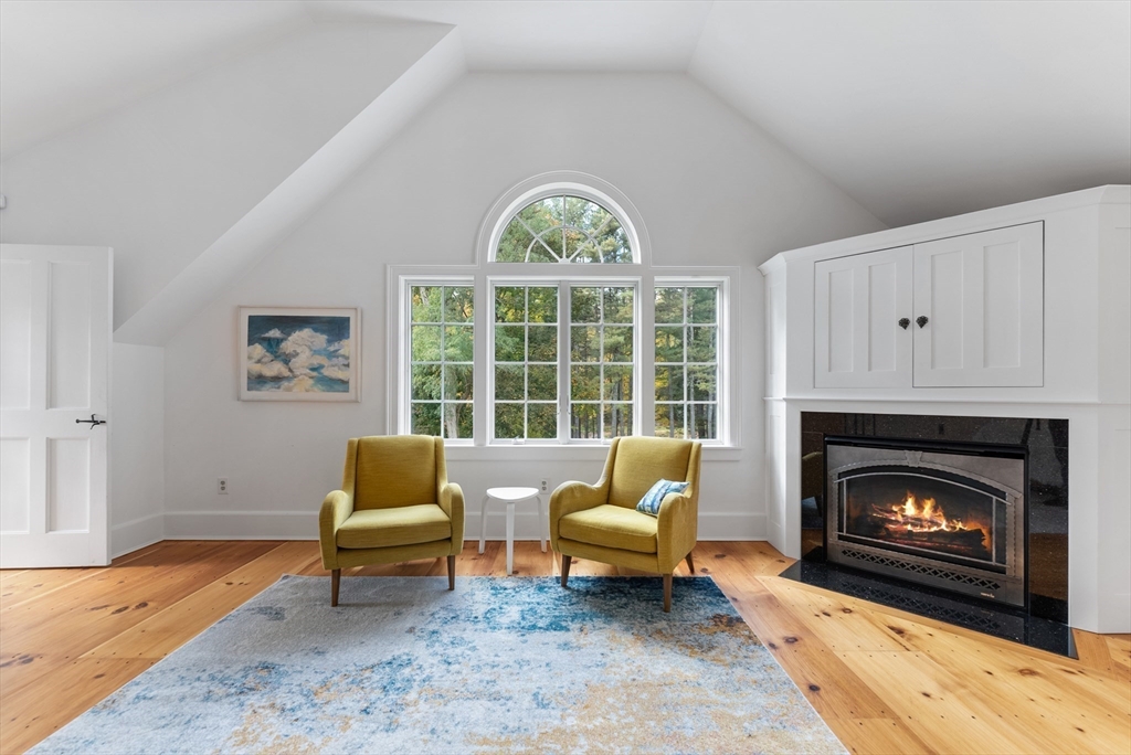74 Wright Road Ashby, MA 01431 - Photo 14 of 26 a living room with furniture and a fireplace